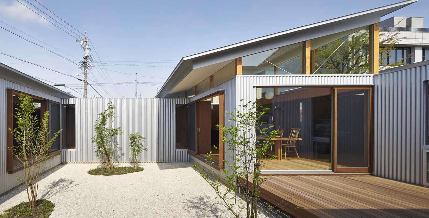 Expansion of a detached house. Harmonious continuation between the